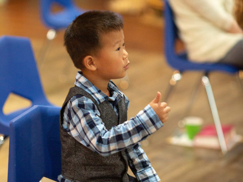 A boy sits in a Sunday School class